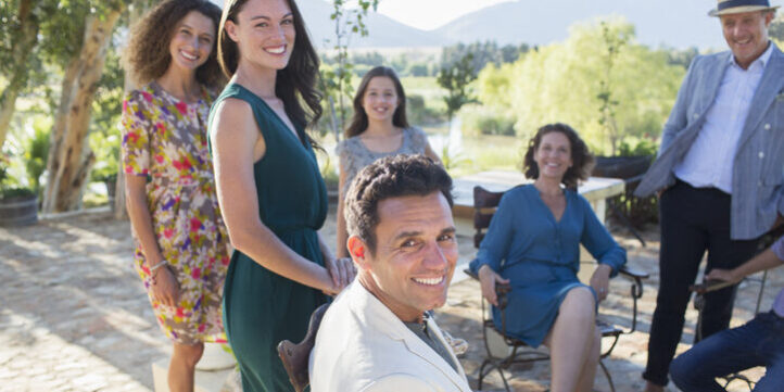 Family gathered on backyard patio