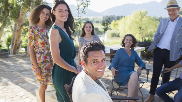 Family gathered on backyard patio