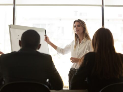 confident-female-speaker-making-whiteboard-presentation-to-employees.jpg?s=1024×1024&w=is&k=20&c=7cTIlsHTAlpspNgGczwh94dqP22n63uaBCSyHi9SueU=